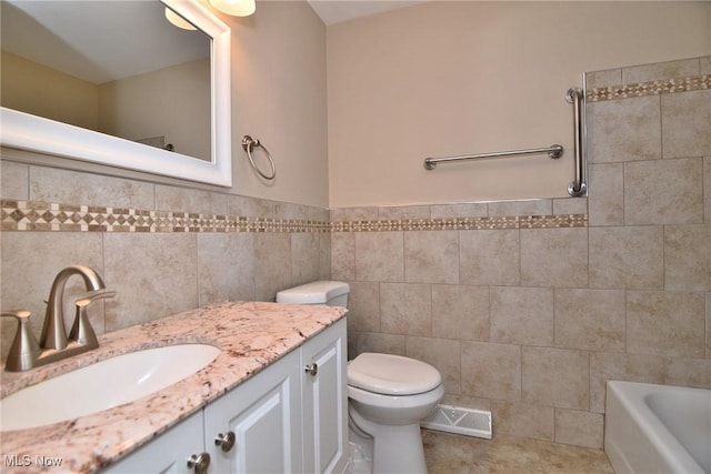 3333 Warrensville Center Rd Unit 204, Shaker Heights, OH 44122 - full bathroom featuring vanity, tile walls, toilet, visible vents, and a bath