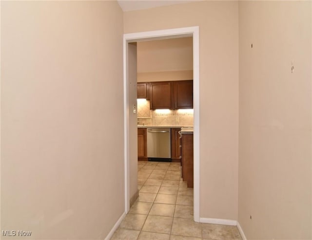 3333 Warrensville Center Rd Unit 204, Shaker Heights, OH 44122 - hall with baseboards and light tile patterned floors