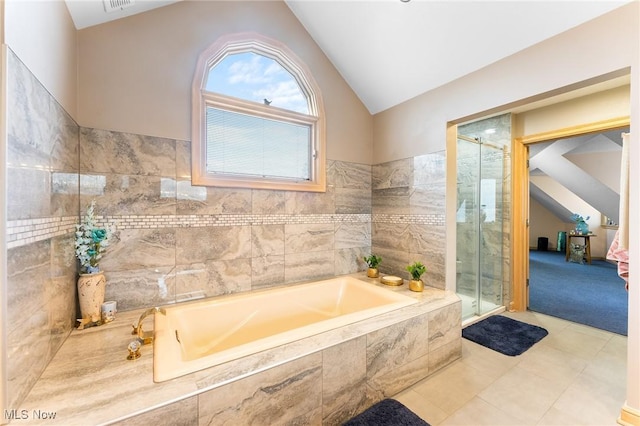 174 N Broad St, Canfield, OH 44406 - bathroom with a garden tub, vaulted ceiling, tile patterned flooring, and a stall shower