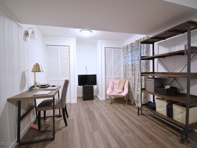 office space with wood finished floors