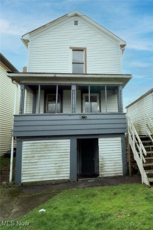 view of front of house with stairs