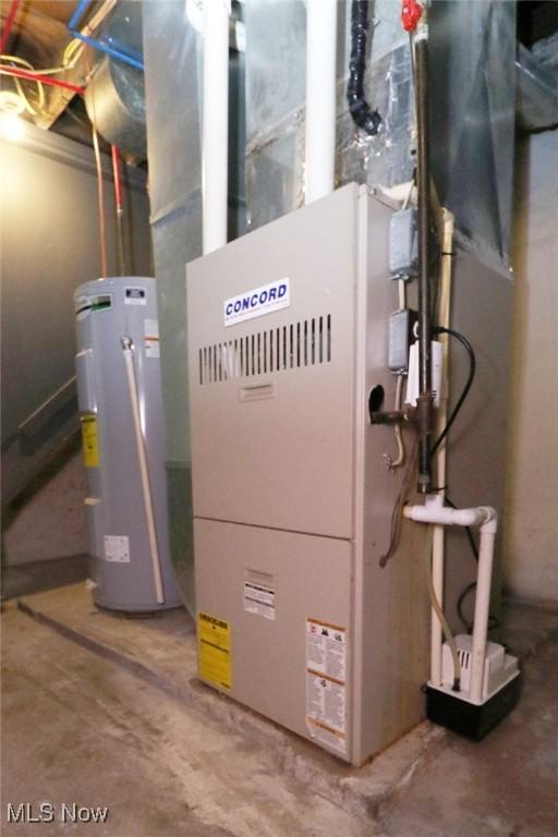 utility room featuring electric water heater