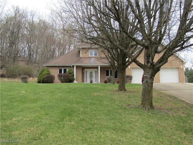 230 Bryden Rd, Weirton, WV 26062 - view of front of home with a garage, a front lawn, brick siding, a shingled roof, and concrete driveway