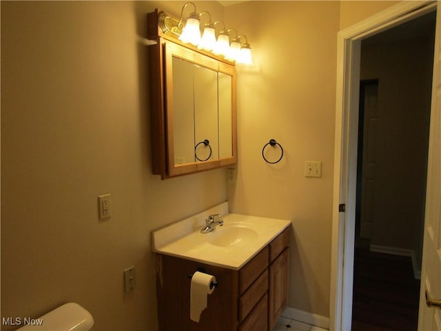 230 Bryden Rd, Weirton, WV 26062 - half bath with toilet, vanity, and baseboards