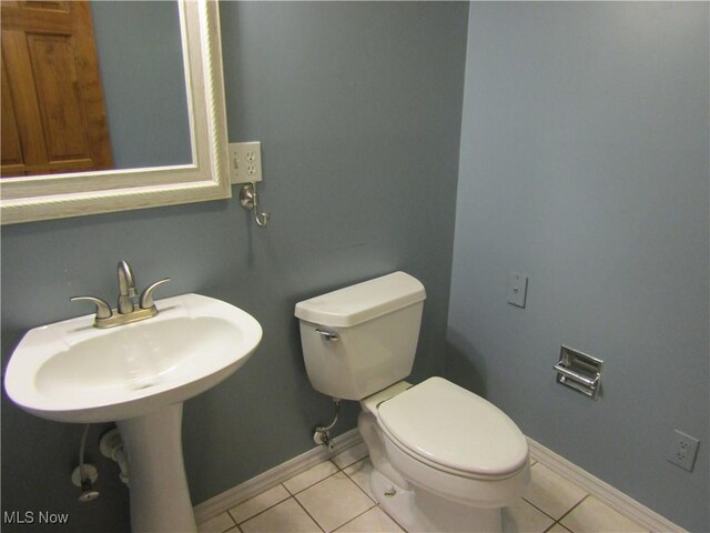 230 Bryden Rd, Weirton, WV 26062 - bathroom with tile patterned floors, baseboards, and toilet