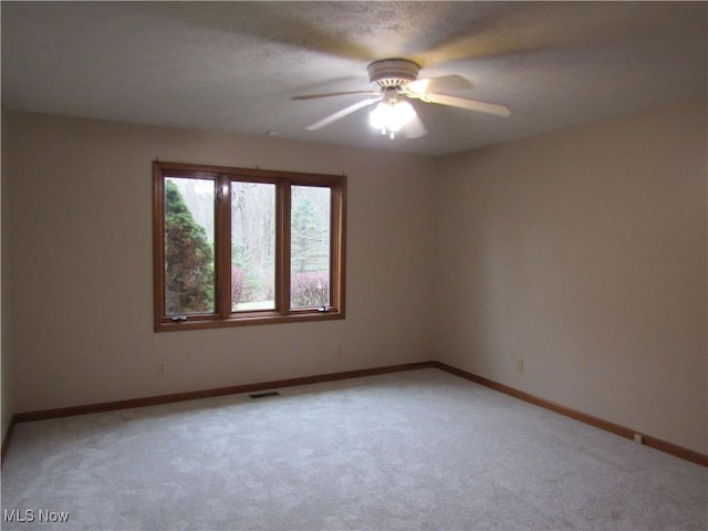 230 Bryden Rd, Weirton, WV 26062 - unfurnished room featuring light carpet, ceiling fan, baseboards, and visible vents