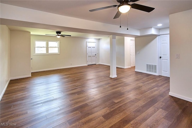 basement featuring dark wood-style floors, baseboards, visible vents, recessed lighting, and ceiling fan