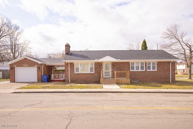 ranch-style house with concrete driveway, brick siding, a chimney, and an attached garage