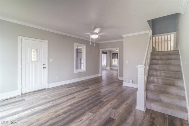entryway with stairs, baseboards, wood finished floors, and ceiling fan