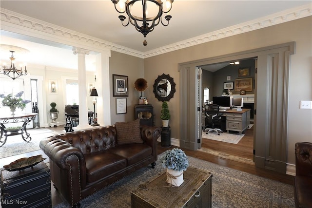 128 Center St, Milan, OH 44846 - living area featuring baseboards, an inviting chandelier, and dark wood-style flooring