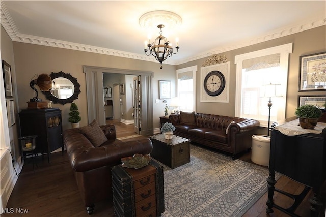 128 Center St, Milan, OH 44846 - living room with an inviting chandelier and wood finished floors
