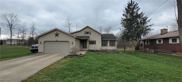 view of front of house featuring a front yard, an attached garage, cooling unit, and driveway