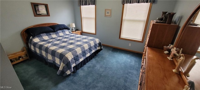 carpeted bedroom with baseboards