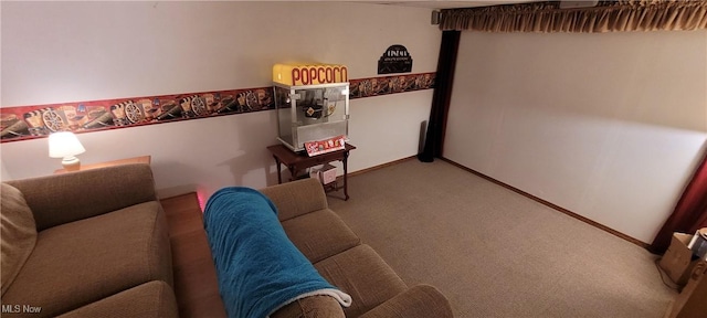 living area featuring carpet floors