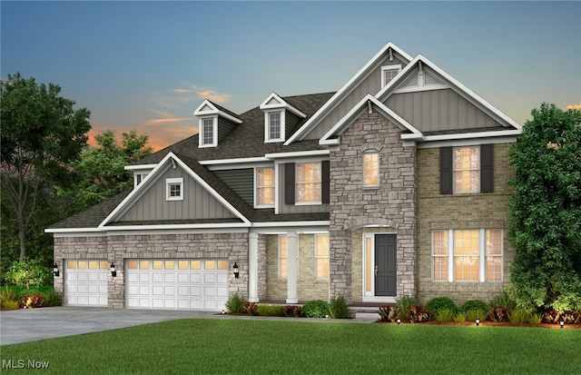 625 Lake Placid Ct, Orange, OH 44022 - view of front facade with board and batten siding, concrete driveway, a front yard, and stone siding