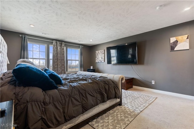 5454 Schueller Blvd, Sheffield Village, OH 44054 - bedroom featuring carpet flooring, baseboards, and a textured ceiling