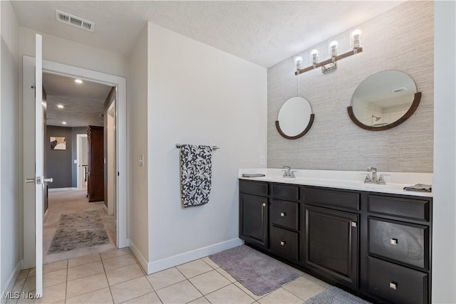 5454 Schueller Blvd, Sheffield Village, OH 44054 - full bathroom with a sink, visible vents, baseboards, and tile patterned flooring