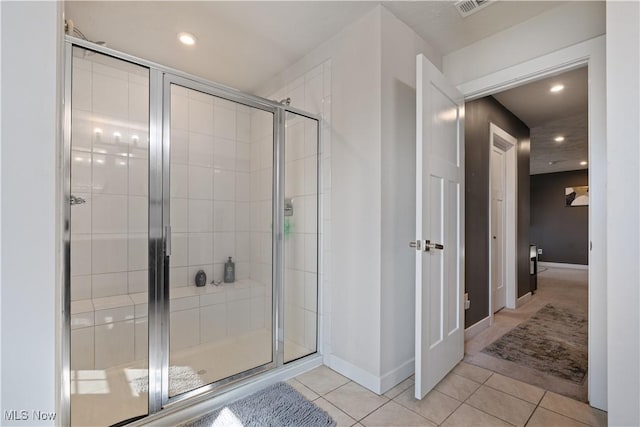 5454 Schueller Blvd, Sheffield Village, OH 44054 - full bathroom with tile patterned floors, a shower stall, recessed lighting, and baseboards