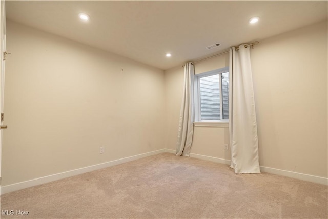 5454 Schueller Blvd, Sheffield Village, OH 44054 - unfurnished room with light colored carpet, baseboards, and recessed lighting