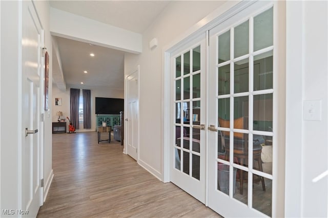 5454 Schueller Blvd, Sheffield Village, OH 44054 - corridor featuring recessed lighting, french doors, and wood finished floors