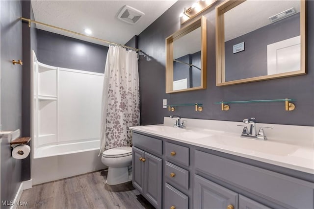 5454 Schueller Blvd, Sheffield Village, OH 44054 - full bath with a sink, visible vents, and toilet