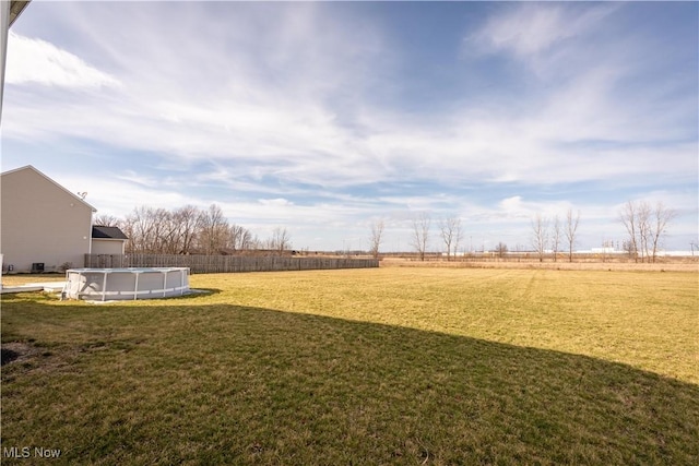 5454 Schueller Blvd, Sheffield Village, OH 44054 - view of yard with an outdoor pool and fence