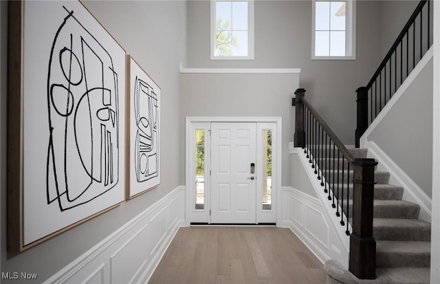 3691 Summerfield Ln, Richfield, OH 44286 - entrance foyer with wood finished floors, plenty of natural light, and stairs