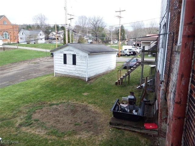 39 E Main St, Crooksville, OH 43731 - view of outdoor structure featuring a residential view, an outdoor structure, and stairs