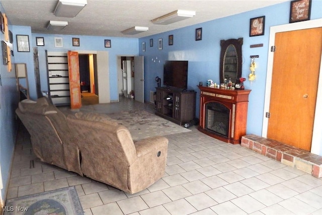 39 E Main St, Crooksville, OH 43731 - tiled living area with a fireplace