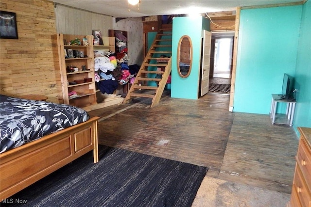 39 E Main St, Crooksville, OH 43731 - bedroom with wood finished floors and wood walls