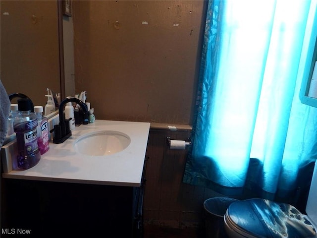 39 E Main St, Crooksville, OH 43731 - bathroom featuring toilet and vanity
