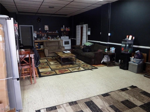39 E Main St, Crooksville, OH 43731 - living room featuring a drop ceiling