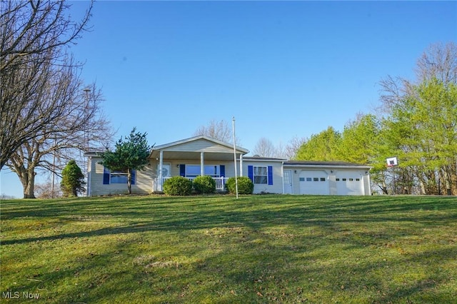 8672 Ridgeview Rd, Chandlersville, OH 43727 - ranch-style house with covered porch, an attached garage, and a front lawn