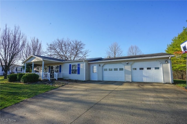 8672 Ridgeview Rd, Chandlersville, OH 43727 - ranch-style house featuring driveway, covered porch, a front yard, and an attached garage