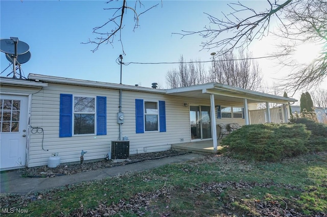 8672 Ridgeview Rd, Chandlersville, OH 43727 - rear view of property with cooling unit and a patio