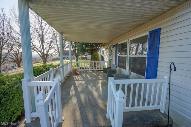8672 Ridgeview Rd, Chandlersville, OH 43727 - wooden terrace with a porch