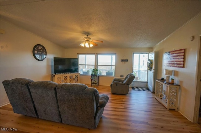 8672 Ridgeview Rd, Chandlersville, OH 43727 - living room with a textured ceiling, ceiling fan, and wood finished floors