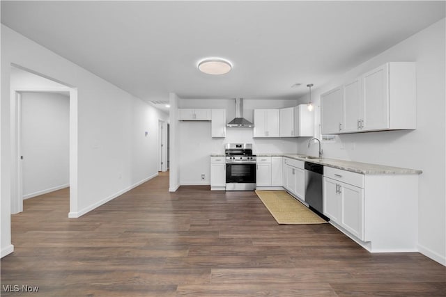 1996 E Oldgate Rd, Sandusky, OH 44870 - kitchen featuring dark wood-style flooring, baseboards, wall chimney exhaust hood, stainless steel appliances, and a sink