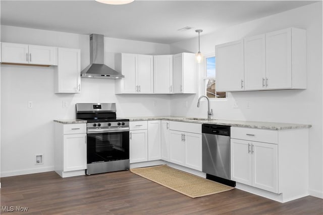 1996 E Oldgate Rd, Sandusky, OH 44870 - kitchen with white cabinets, wall chimney exhaust hood, a sink, and appliances with stainless steel finishes