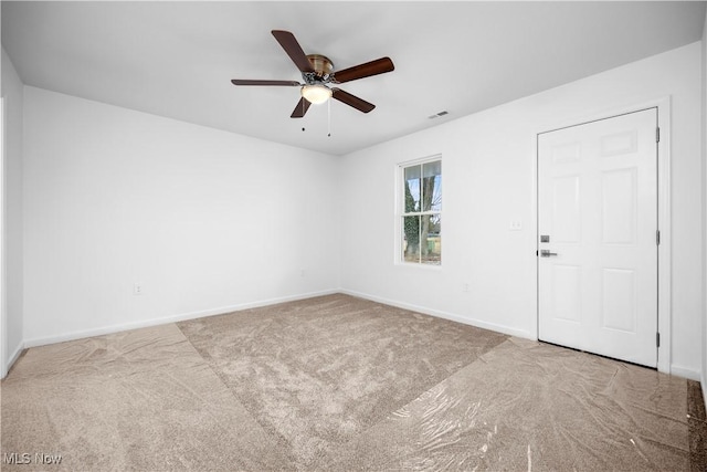 1996 E Oldgate Rd, Sandusky, OH 44870 - unfurnished room featuring baseboards, carpet flooring, ceiling fan, and visible vents