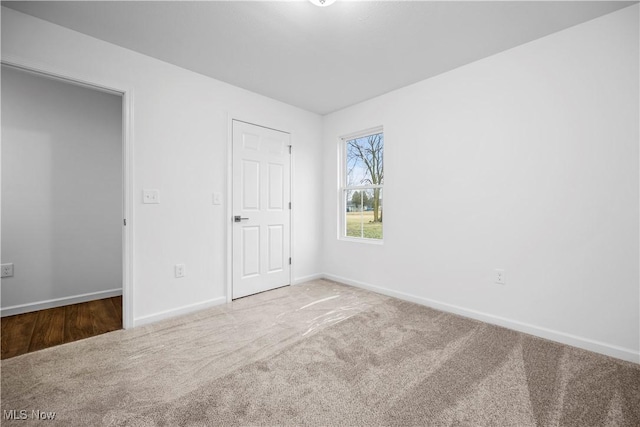 1996 E Oldgate Rd, Sandusky, OH 44870 - carpeted empty room with baseboards