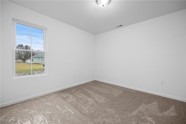 1996 E Oldgate Rd, Sandusky, OH 44870 - carpeted spare room featuring baseboards and visible vents