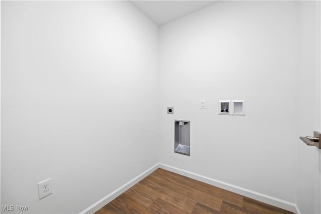 1996 E Oldgate Rd, Sandusky, OH 44870 - laundry room featuring laundry area, dark wood finished floors, hookup for an electric dryer, washer hookup, and baseboards