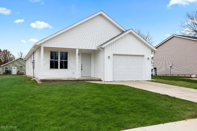 1996 E Oldgate Rd, Sandusky, OH 44870 - ranch-style home featuring a front yard, a garage, and concrete driveway