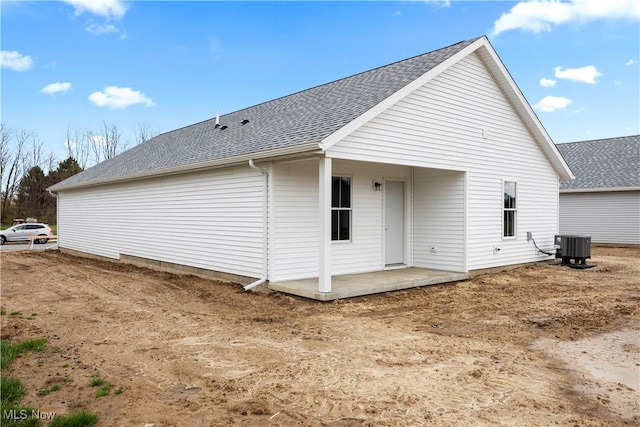 1996 E Oldgate Rd, Sandusky, OH 44870 - back of property featuring roof with shingles and central air condition unit