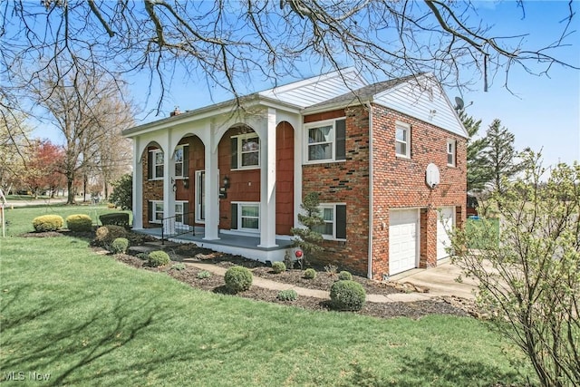 view of front facade featuring a garage, covered porch, a front yard, brick siding, and concrete driveway