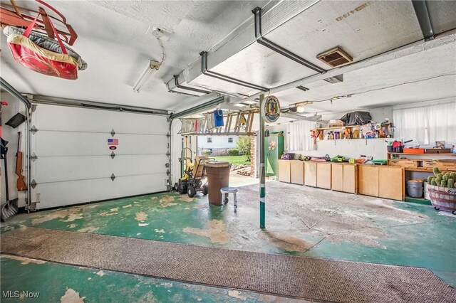 garage featuring water heater