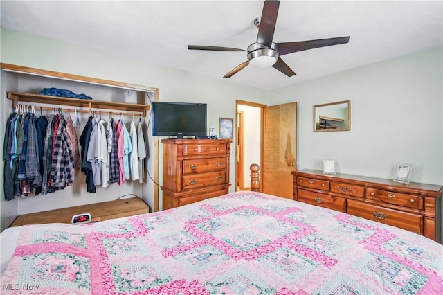 bedroom with a closet and a ceiling fan