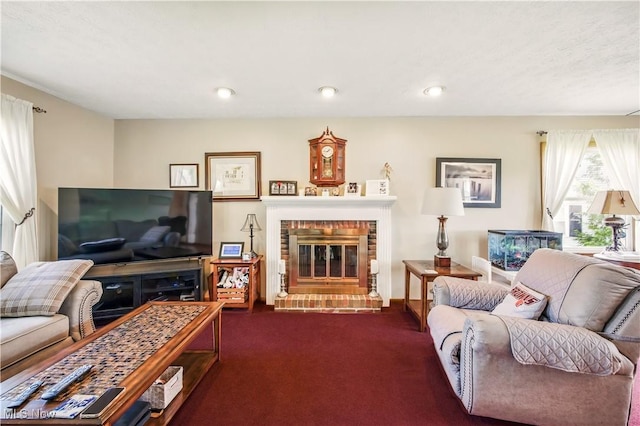 living area with a fireplace and dark carpet