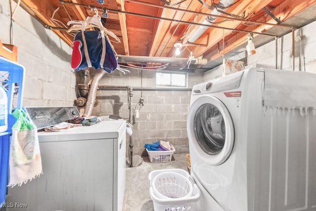 laundry area featuring laundry area and washing machine and clothes dryer